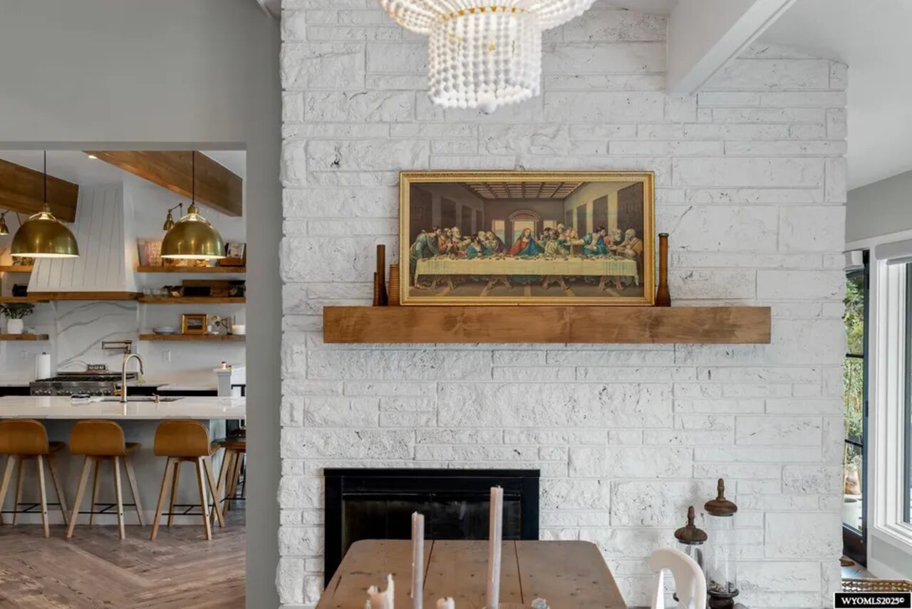 White brick fireplace and gathering space